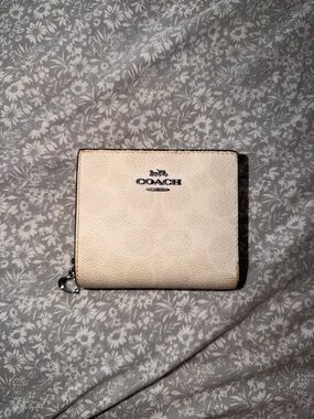 Coach Ivory Leather Wallet with Silver Accents